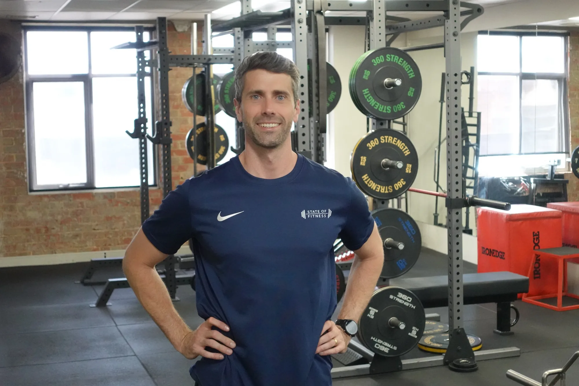 Dylan Jones coaching a client at State of Fitness